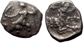 Lycaonia, Laranda AR Obol (Silver, 0.66g, 10mm) ca 324/3 BC.
Obv: Baaltars seated left, torso facing, holding grain ear and grape bunch in extended r...
