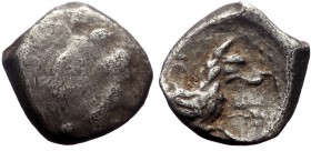 Lycaonia, Laranda AR Obol (Silver, 0.67g, 9mm) ca 324/3 BC.
Obv: Baaltars seated left, torso facing, holding grain ear and grape bunch in extended ri...