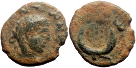 Mesopotamia, Carrhae AE (Bronze, 2.70g, 16mm) Elagabalus (218-222) 
Obv: ΑΥΤ ΑΝΤωΝΕΙ; radiate head of Elagabalus (?), right
Rev: ΚΑΡ ΚΟΛω Π; rosette o...