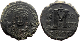 Mauricius Tiberius (582-602) AE Follis (Bronze, 10.70g, 27mm) Theoupolis (Antiochia), 
Obv. Crowned bust of Maurice facing, wearing consular robes, ho...