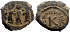 Heraclius, with Martina and Heraclius Constantine (610-641) AE Follis (Bronze, 3.98g, 18mm) Cyzicus, RY 12 = 621/8. 
Obv: Heraclius in center, Heracli...