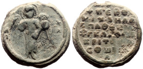 Byzantine Lead seal (7.41g, 20mm)
Michael Sphorakles (?) protospatharios, epi tou Chrysotriklinou, judge.
Obv: The Archangel Michael standing, holdi...