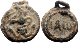 A lead byzantine gnostic pendant (3.12g, 15mm) 6th/7th cent.
Obv: Frontal view of a cock-headed (Abraxas) in armour, head to right. Right hand raised...