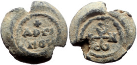 Byzantine Lead Seal (6.96g, 20mm)
Ioannes Arsino(o)s(?) (sixth century).
Obv: Cruciform monogram. Letters: α-ι-ν-ᴕ-ω =  Ἰωάννου
Rev: Inscription in...