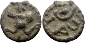A lead byzantine gnostic pendant (1.25g, 13mm) 6th/7th cent.
A: Frontal view of a cock-headed (Abraxas) in armour, head to right. Right hand raised h...