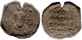 Byzantine Lead Seal (7.33g, 25mm) John(?) Kamateros proedros (eleventh/twelfth century)
Obv: Bust of Saint (Basil or Nicholas?) olding the book with ...