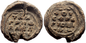 Byzantine Lead Seal (9.32g, 21mm).
Anonymous (eleventh/twelfth century)
Obv: Inscription of four lines beginning with a cross +οὗ σφραγίς εἰμι.
Rev...