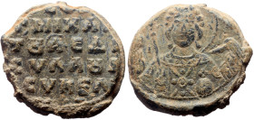 Byzantine Lead Seal (13.39g, 24mm) Michael proedros, sylaos (? and synkelos.
Obv: Bust of the Archangel Michael holding the sceptre over his right sh...