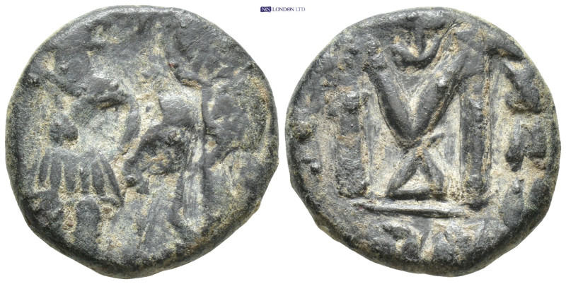 Heraclius. 610-641. AE follis (18mm, 5.7 g). Heraclius with long beard on left w...