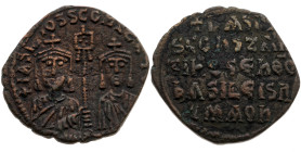 Kaiserreich 
Basilius I., 867-886
Follis

Vs: Brustbilder des Kaisers und seines Sohnes Constantinus von vorne, Umschrift
Rs: Fünf Zeilen Schrift...