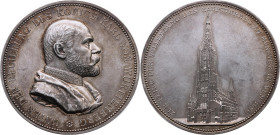 Ulm 
Stadt
Silber-Medaille
1890

auf die Fertigstellung des Turmes am Münster
Vs: Brustbild des Königs Karl von Württemberg n. r., Umschrift
Rs...