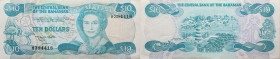 Bahamas 
10 Dollars
1974

Vs: Queen Elisabeth, links Flamingos
Rs: Leuchtturm im Hafen von Hope Town, Abaco

Literatur: WPM 46
Erhaltung: Vorz...