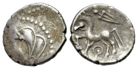 Central Gaul, Bituriges Cubi, c. 1st century BC. AR Quinarius (14mm, 1.88g, 12hg). Bare male head l. R/ Horse prancing l.; sword above; symbol below. ...