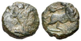 Central Italy, Uncertain, mid-late 1st century BC. Æ (15mm, 3.85g, 6h). Wreathed head of young Dionysus r. R/ Panther standing r., head facing, holdin...