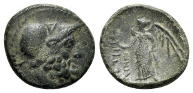Bruttium, Petelia, late 3rd century BC. Æ (17mm, 3.34g, 9h). Helmeted head of Ares r. R/ Nike standing l., holding wreath. HNItaly 2456; SNG ANS 607. ...
