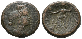 Sicily, Hybla Megala, c. 2nd century BC. Æ (19mm, 7.30g). Veiled bust of Artemis-Hyblaia r., wearing polos; bee to l. R/ Dionysos standing l., holding...
