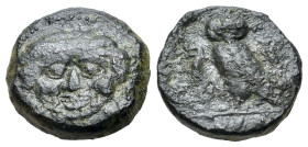 Sicily, Kamarina, c. 420-410 BC. Æ Tetras (15mm, 3.29g, 11h). Gorgoneion. R/ Owl standing l., head facing, holding lizard in talon. CNS III, 21; SNG A...