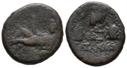 Sicily, Katane, late 2nd - early 1st century BC. Æ (18mm, 6.27g). River-god Amenanos, holding rhyton, reclining l. on amphora. R/ Caps of the Dioskour...