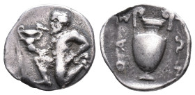 Island of Thrace, Thasos, c. 412-404 BC. AR Trihemiobol (11mm, 0.86g). Satyr kneeling l., holding kantharos. R/ Amphora. Le Rider, Thasiennes 27; SNG ...