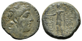 Seleukid Kings, Antiochos IX (114/3-95 BC). Æ (22mm, 7.33g, 12h). Tarsos, c. 114/3-112. Diademed head r. R/ Dionysos standing l., holding kantharos an...
