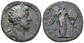 Marcus Aurelius (161-180). Æ Sestertius (27mm, 20.15g). Rome, AD 166. Laureate head r. R/ Victory standing r., holding palm frond and placing shield i...