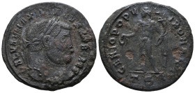 Galerius (Caesar, 293-305). Æ Follis (28mm, 8.57g). Thessalonica, 298-9. Laureate head r. R/ Genius standing l., holding patera and cornucopia; TS[…]....