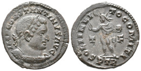 Constantine I (307/310-337). Æ Follis (21mm, 3.92g). Treveri, 310-3. Laureate and cuirassed bust r. R/ Sol standing facing, head l., holding globe and...