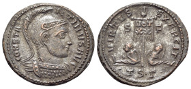 Constantine I (307/310-337). Æ Follis (19mm, 3.41g, 11h). Rome, AD 315. Laureate, draped and cuirassed bust r. R/ Sol standing l. holding globe and ra...