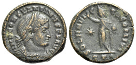 Constantine I (307/310-337). Æ Follis (18 mm, 3.93g, 6h). Ticinum, 314. Laureate, cuirassed bust r. R/ Sol standing l., raising hand and holding globe...