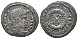 Constantine I (307/310-337). Æ Follis (18mm, 3.7g). Ticinum, 320. Laureate head r. R/ Laurel-wreath enclosing VOT/*/XX; //TT. RIC VII 130. Near VF