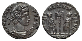 Constans (337-350). Æ Follis (15mm, 1.53g, 6h). Treveri, 348-350. Laureate, draped and cuirassed bust r. R/ Two soldiers flanking one standard with M ...