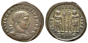 Constantius II (Caesar, 324-337). Æ (18mm, 2.70g, 12h). Antioch, 330-335. Laureate and cuirassed bust r. R/ Two soldiers flanking two standards; SMANZ...