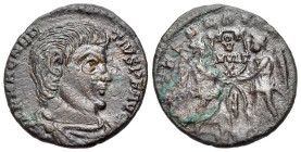 Magnentius (350-353). Æ (19mm, 2.88g, 12h). Imitation of Treveri(?) Bare-headed and cuirassed bust r. R/ Two Victories standing facing each other, hol...