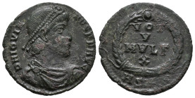 Jovian (363-364). Æ. Sirmium, 363-4. Pearl-diademed, draped and cuirassed bust r. R/ VOT/V/MVLT/X in four lines; all within laurel wreath; ASIRM. RIC ...