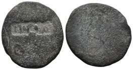 Uncertain countermarked Æ coin (23mm, 4.57g). Rectangular c/m. Fine