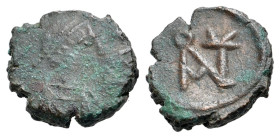 Anastasius I (491-518). Æ Nummus (8mm, 0.60g, 6h). Constantinople, 491-498. Diademed, draped and cuirassed bust r. R/ Monogram of Anastasius. MIBE 40;...