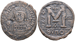 Justinian I (527-565). Æ 40 Nummi (36mm, 22.98g), Theoupolis (Antioch), year 13 (539/40). Helmeted and cuirassed bust facing, holding globus cruciger ...