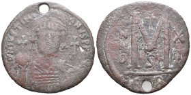 Justinian I (527-565). Æ 40 Nummi (34mm, 18,27g). Carthage, year 13 (539/40). Helmeted and cuirassed bust facing, holding globus cruciger and shield; ...