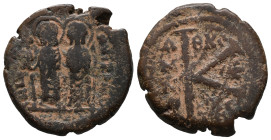 Justin II and Sophia (565-578). Æ 20 Nummi (28mm, 10.06g). Thessalonica. Nimbate figures of Justin and Sophia seated facing on double throne, holding ...