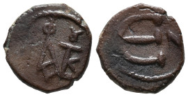 Justin II (565-578). Æ 5 Nummi (13mm, 1.73g). Constantinople. Monogram. R/ Large Є; N to r. Sear 371. Near VF