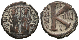 Justin II and Sophia (565-578). Æ 20 Nummi (21mm, 5.71g). Antioch, year 8. Justin, on l., and Sophia, on r., seated facing on a double throne, each ho...