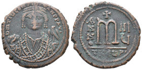 Tiberius II Constantine (578-582). Æ 40 Nummi (25mm, 12.31g). Theoupolis (Antioch), year 8 (581/2). Crowned facing bust, wearing consular robes, holdi...