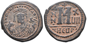 Maurice Tiberius (582-602). Æ 40 Nummi (25mm, 10.91g). Theoupolis (Antioch), year 17 (598/9). Crowned facing bust, wearing consular robes, holding map...