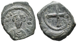 Phocas (602-610). Æ 10 Nummi (17mm, 3.60g). Constantinople. Crowned and cuirassed bust facing, holding globus cruciger and shield. R/ Large X; cross a...