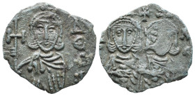 Constantine V (741-775); AE 40 Nummi (17mm, 3.05g). Syracuse, 757-775. Crowned facing busts of Constantine and Leo IV, each wearing chlamys and holdin...