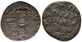 Constantine VII and Romanus I (913-959). Æ 40 Nummi (17mm, 5.57g). Constantinople, 945-950. Crowned facing bust of Romanus I, wearing loros, holding a...
