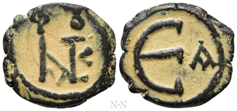 JUSTIN II (565-578). Pentanummium. Theoupolis (Antioch). 

Obv: Monogram.
Rev...