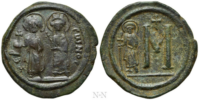 JUSTIN II, with SOPHIA (565-578). Follis. Cherson. 

Obv: XЄPCωNOC. 
Justin a...