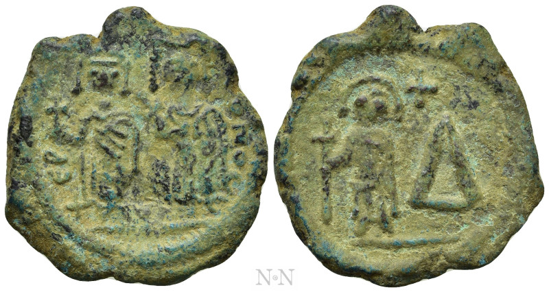 JUSTIN II, with SOPHIA (565-578). Half Follis or 4 Pentanummia. Cherson. 

Obv...