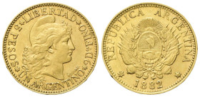 ARGENTINA Repubblica, dal 1881. 5 Pesos o Argentino 1882. Au gr. 8,03 Dr. Testa muliebre a d., con berretto frigio. Rv. Stemma argentino sormontato da...
